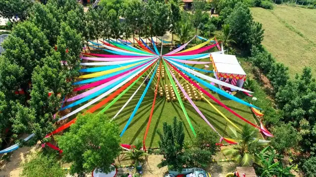 Aerial view of the ribbon-canopied event lawn