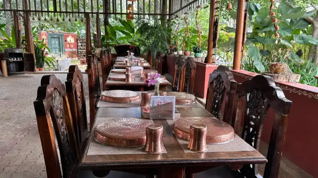 Harvest Kitchen dining hall with copper thalis