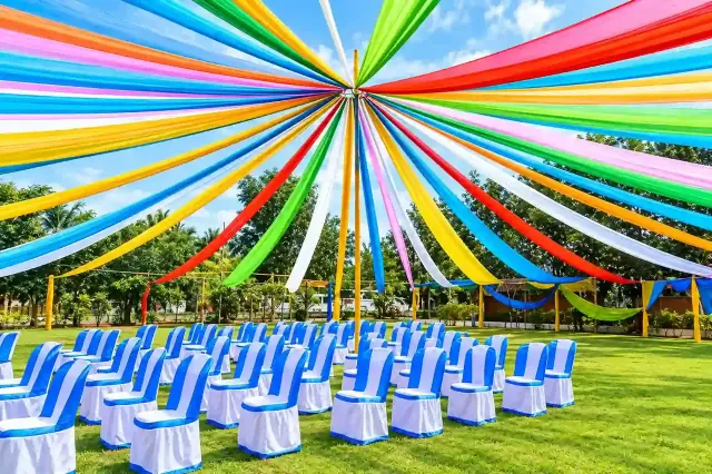 Rainbow ribbon canopy over the event lawn